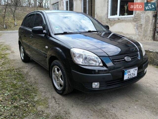 Чорний Кіа Ріо, об'ємом двигуна 1.4 л та пробігом 198 тис. км за 5200 $, фото 1 на Automoto.ua