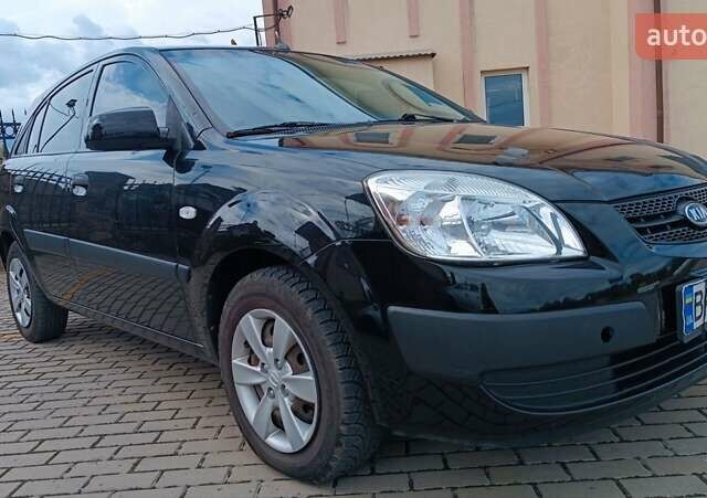 Чорний Кіа Ріо, об'ємом двигуна 1.4 л та пробігом 181 тис. км за 3850 $, фото 32 на Automoto.ua