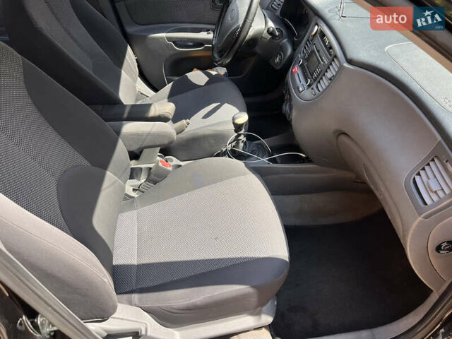 Черный Киа Рио, объемом двигателя 1.4 л и пробегом 174 тыс. км за 4200 $, фото 27 на Automoto.ua