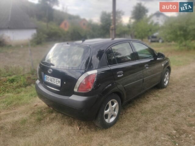 Черный Киа Рио, объемом двигателя 1.4 л и пробегом 260 тыс. км за 3450 $, фото 6 на Automoto.ua