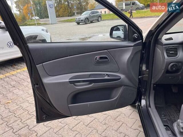 Чорний Кіа Ріо, об'ємом двигуна 1.5 л та пробігом 265 тис. км за 4700 $, фото 9 на Automoto.ua