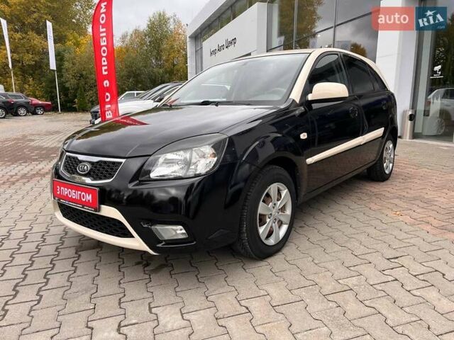 Чорний Кіа Ріо, об'ємом двигуна 1.5 л та пробігом 265 тис. км за 4700 $, фото 2 на Automoto.ua