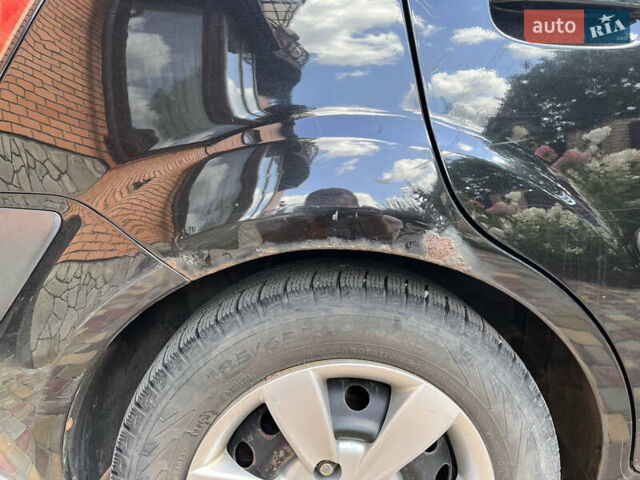 Черный Киа Рио, объемом двигателя 1.4 л и пробегом 174 тыс. км за 4200 $, фото 11 на Automoto.ua