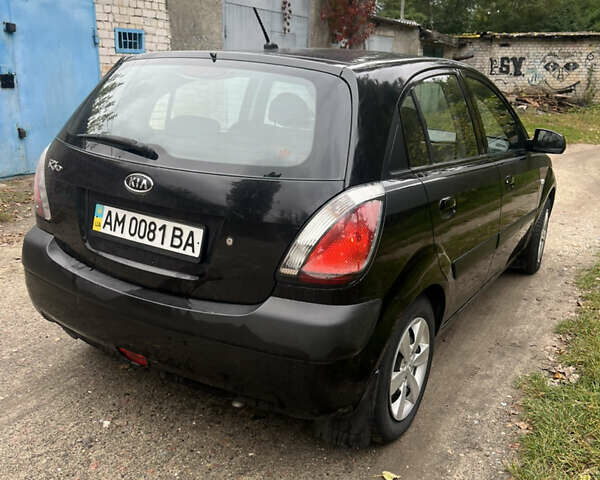 Черный Киа Рио, объемом двигателя 1.4 л и пробегом 227 тыс. км за 4800 $, фото 7 на Automoto.ua