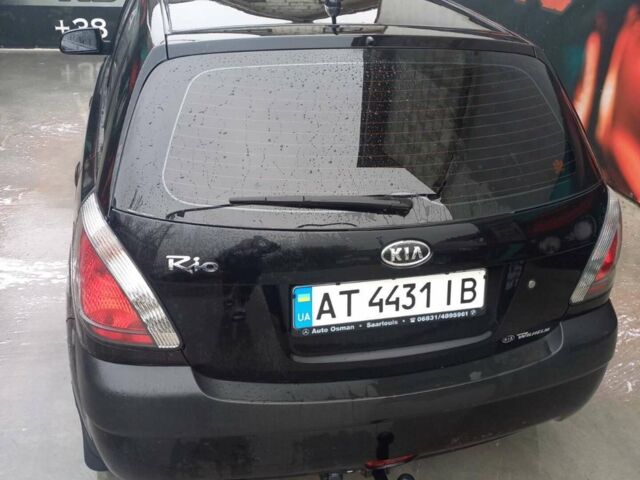 Чорний Кіа Ріо, об'ємом двигуна 1.4 л та пробігом 230 тис. км за 5248 $, фото 2 на Automoto.ua