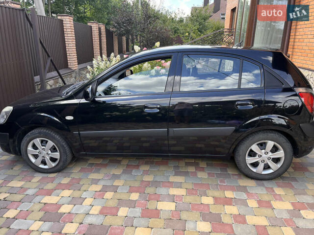 Черный Киа Рио, объемом двигателя 1.4 л и пробегом 174 тыс. км за 4200 $, фото 8 на Automoto.ua
