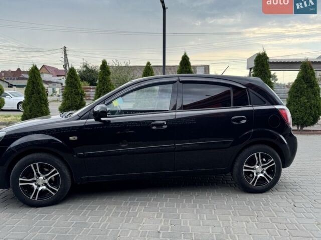 Черный Киа Рио, объемом двигателя 1.4 л и пробегом 202 тыс. км за 5000 $, фото 6 на Automoto.ua