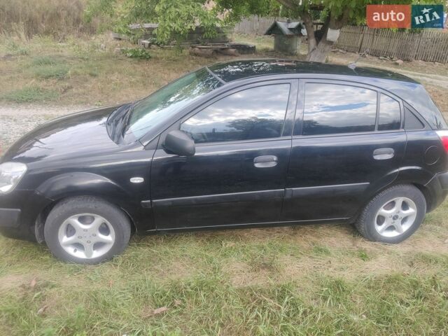 Черный Киа Рио, объемом двигателя 1.4 л и пробегом 260 тыс. км за 3450 $, фото 3 на Automoto.ua