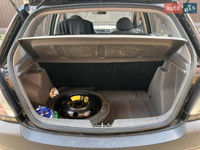 Черный Киа Рио, объемом двигателя 1.4 л и пробегом 174 тыс. км за 4200 $, фото 15 на Automoto.ua