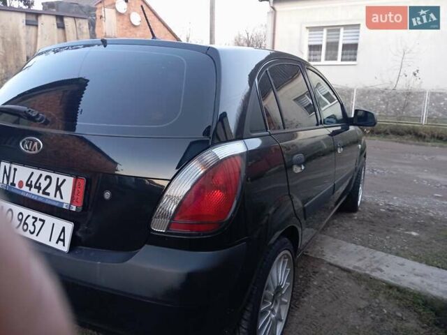 Черный Киа Рио, объемом двигателя 1.4 л и пробегом 201 тыс. км за 4699 $, фото 5 на Automoto.ua
