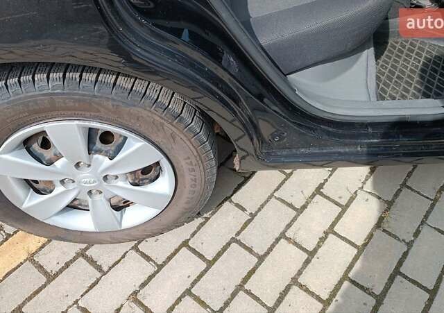Чорний Кіа Ріо, об'ємом двигуна 1.4 л та пробігом 181 тис. км за 3850 $, фото 69 на Automoto.ua