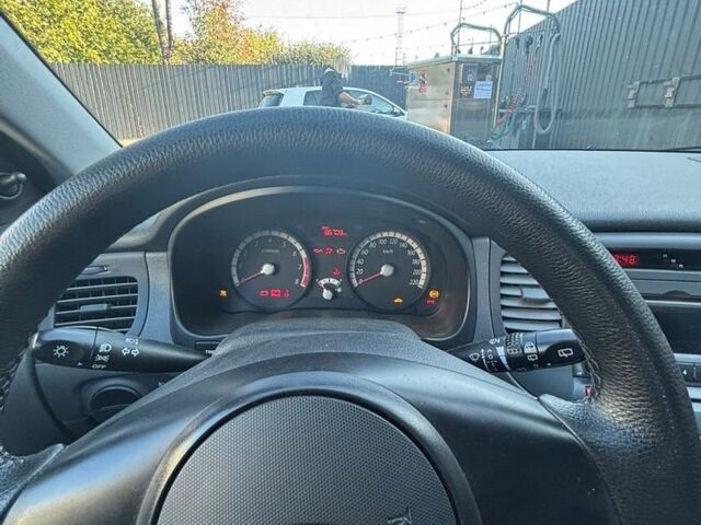 Черный Киа Рио, объемом двигателя 1.4 л и пробегом 87 тыс. км за 4850 $, фото 7 на Automoto.ua