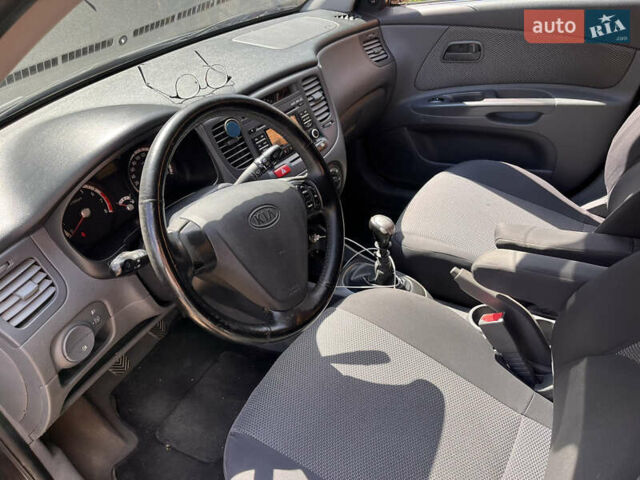 Черный Киа Рио, объемом двигателя 1.4 л и пробегом 174 тыс. км за 4200 $, фото 32 на Automoto.ua