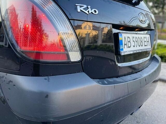 Чорний Кіа Ріо, об'ємом двигуна 1.4 л та пробігом 176 тис. км за 3899 $, фото 4 на Automoto.ua