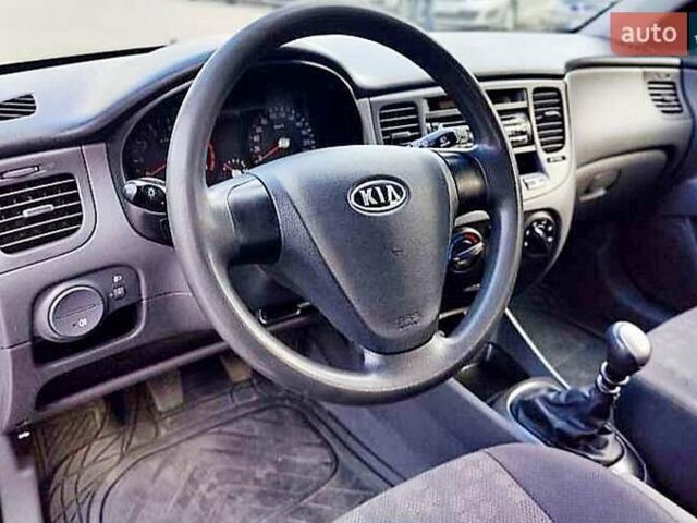 Черный Киа Рио, объемом двигателя 1.4 л и пробегом 218 тыс. км за 4600 $, фото 1 на Automoto.ua