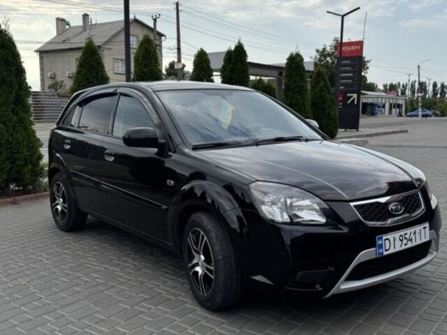 Черный Киа Рио, объемом двигателя 1.4 л и пробегом 202 тыс. км за 5000 $, фото 2 на Automoto.ua