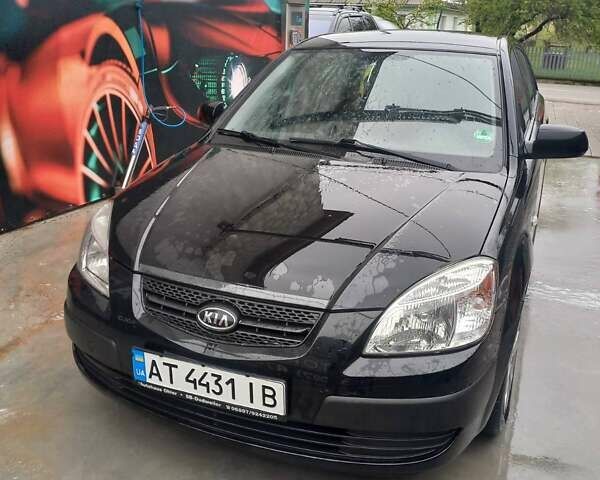 Черный Киа Рио, объемом двигателя 1.4 л и пробегом 230 тыс. км за 5234 $, фото 1 на Automoto.ua