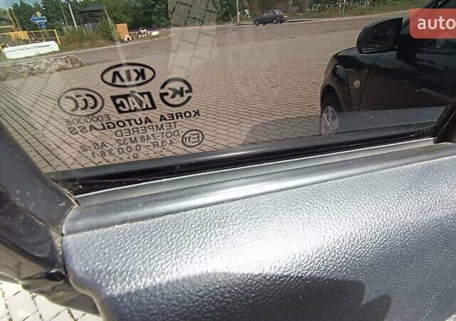 Чорний Кіа Ріо, об'ємом двигуна 1.4 л та пробігом 181 тис. км за 3850 $, фото 81 на Automoto.ua