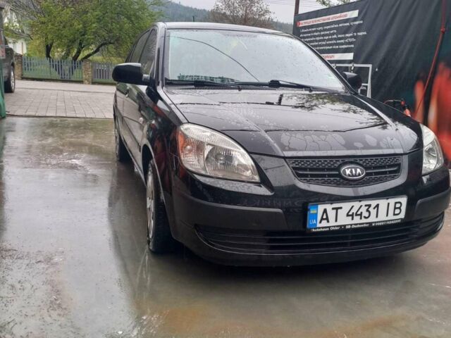 Чорний Кіа Ріо, об'ємом двигуна 1.4 л та пробігом 230 тис. км за 5248 $, фото 8 на Automoto.ua