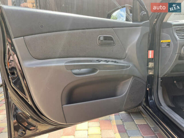 Черный Киа Рио, объемом двигателя 1.4 л и пробегом 174 тыс. км за 4200 $, фото 29 на Automoto.ua