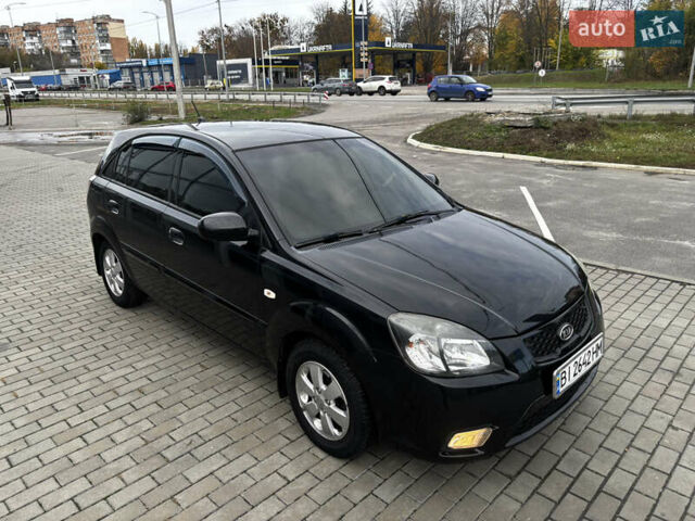 Черный Киа Рио, объемом двигателя 1.4 л и пробегом 172 тыс. км за 5700 $, фото 11 на Automoto.ua