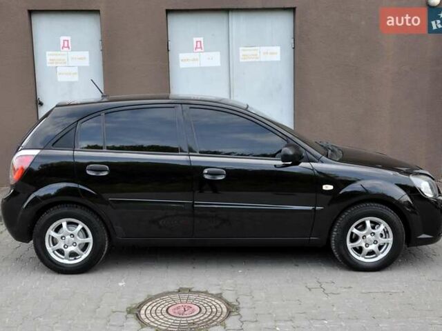 Чорний Кіа Ріо, об'ємом двигуна 1.4 л та пробігом 194 тис. км за 4700 $, фото 8 на Automoto.ua