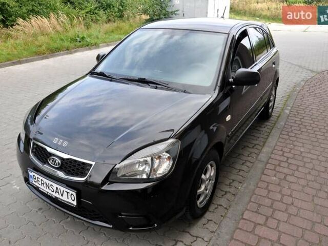 Чорний Кіа Ріо, об'ємом двигуна 1.4 л та пробігом 194 тис. км за 4700 $, фото 2 на Automoto.ua