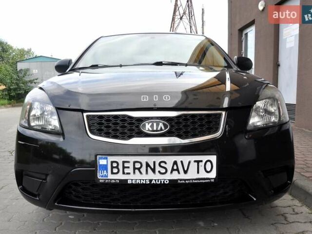 Чорний Кіа Ріо, об'ємом двигуна 1.4 л та пробігом 194 тис. км за 4700 $, фото 5 на Automoto.ua