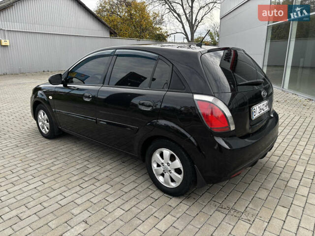 Черный Киа Рио, объемом двигателя 1.4 л и пробегом 172 тыс. км за 5700 $, фото 5 на Automoto.ua
