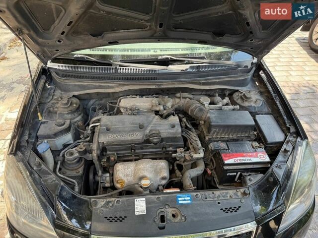 Черный Киа Рио, объемом двигателя 1.4 л и пробегом 245 тыс. км за 5800 $, фото 9 на Automoto.ua