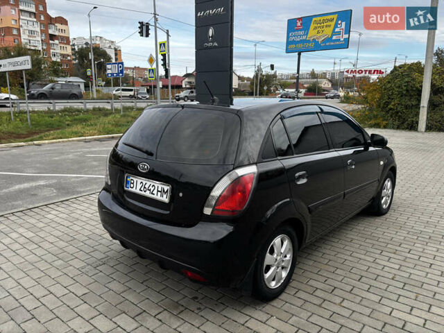Черный Киа Рио, объемом двигателя 1.4 л и пробегом 172 тыс. км за 5700 $, фото 8 на Automoto.ua
