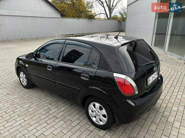 Черный Киа Рио, объемом двигателя 1.4 л и пробегом 172 тыс. км за 5700 $, фото 4 на Automoto.ua