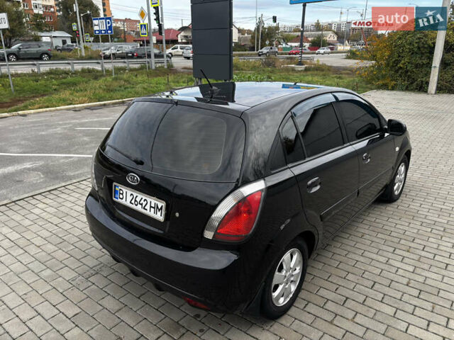 Черный Киа Рио, объемом двигателя 1.4 л и пробегом 172 тыс. км за 5700 $, фото 7 на Automoto.ua