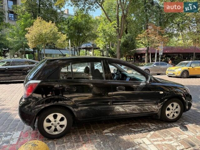 Черный Киа Рио, объемом двигателя 1.4 л и пробегом 245 тыс. км за 5800 $, фото 1 на Automoto.ua