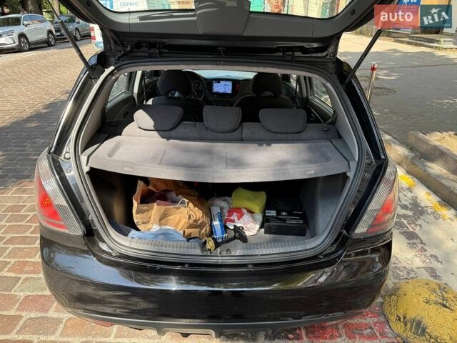 Черный Киа Рио, объемом двигателя 1.4 л и пробегом 245 тыс. км за 5800 $, фото 8 на Automoto.ua