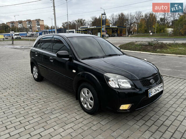 Черный Киа Рио, объемом двигателя 1.4 л и пробегом 172 тыс. км за 5700 $, фото 12 на Automoto.ua