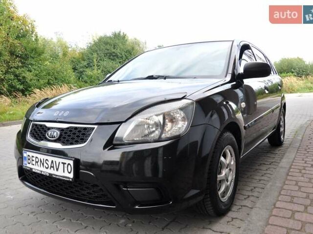 Чорний Кіа Ріо, об'ємом двигуна 1.4 л та пробігом 194 тис. км за 4700 $, фото 3 на Automoto.ua