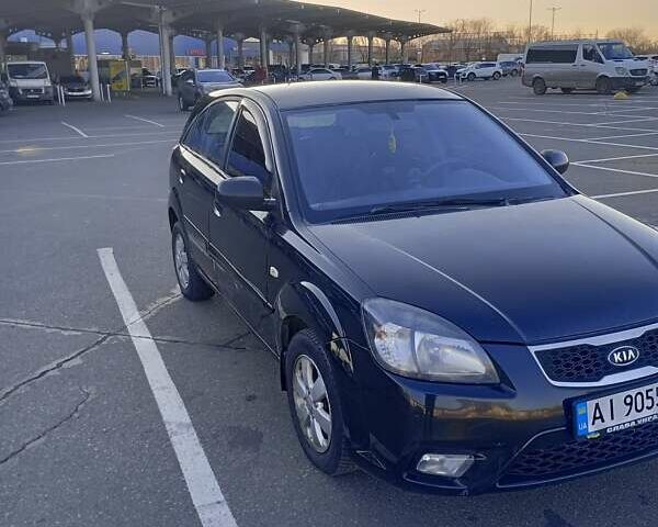 Черный Киа Рио, объемом двигателя 1.4 л и пробегом 270 тыс. км за 5000 $, фото 6 на Automoto.ua
