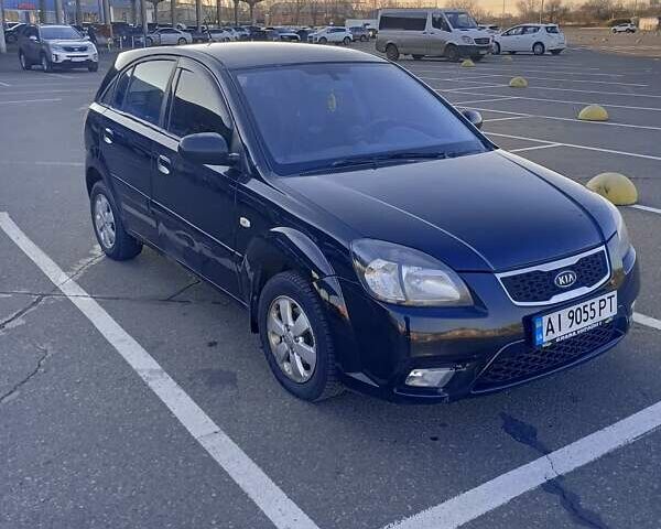 Черный Киа Рио, объемом двигателя 1.4 л и пробегом 270 тыс. км за 5000 $, фото 7 на Automoto.ua