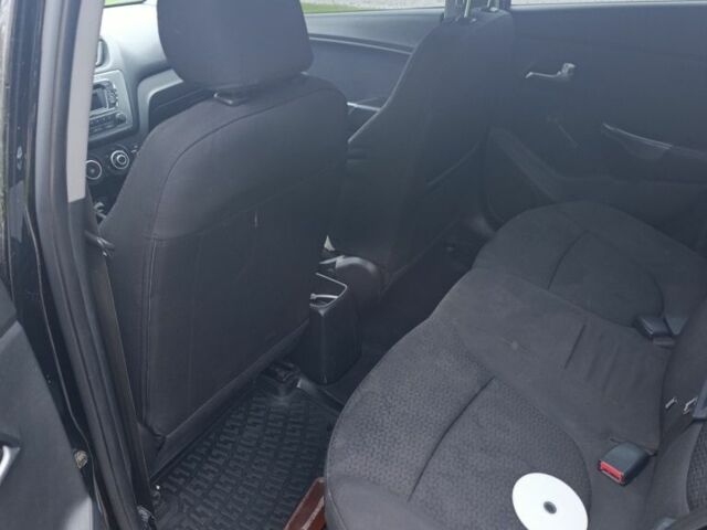 Черный Киа Рио, объемом двигателя 1.4 л и пробегом 3 тыс. км за 6000 $, фото 5 на Automoto.ua