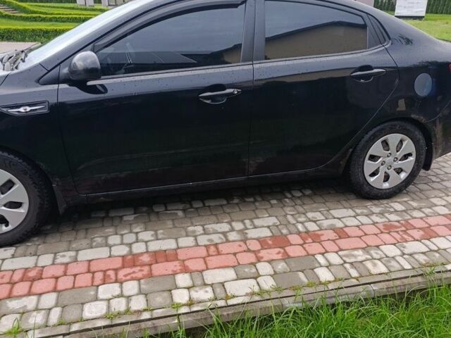 Черный Киа Рио, объемом двигателя 1.4 л и пробегом 3 тыс. км за 6000 $, фото 2 на Automoto.ua