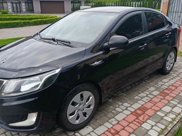 Черный Киа Рио, объемом двигателя 1.4 л и пробегом 3 тыс. км за 6000 $, фото 1 на Automoto.ua