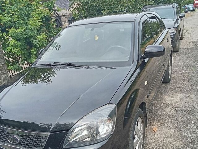 Чорний Кіа Ріо, об'ємом двигуна 1.4 л та пробігом 274 тис. км за 5800 $, фото 4 на Automoto.ua