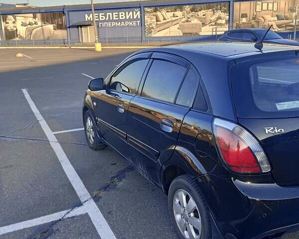 Черный Киа Рио, объемом двигателя 1.4 л и пробегом 270 тыс. км за 5000 $, фото 9 на Automoto.ua