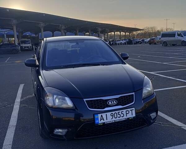 Черный Киа Рио, объемом двигателя 1.4 л и пробегом 270 тыс. км за 5000 $, фото 5 на Automoto.ua