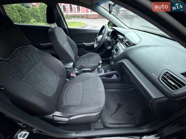 Черный Киа Рио, объемом двигателя 1.6 л и пробегом 94 тыс. км за 7300 $, фото 19 на Automoto.ua