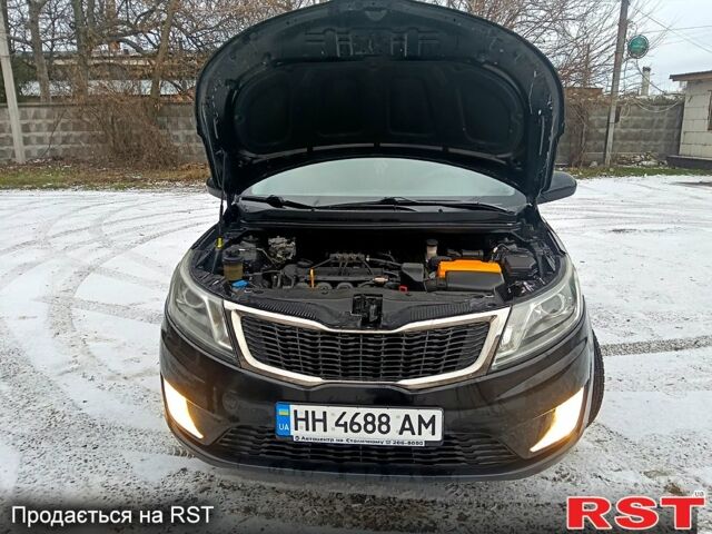 Чорний Кіа Ріо, об'ємом двигуна 1.6 л та пробігом 16000 тис. км за 7800 $, фото 12 на Automoto.ua