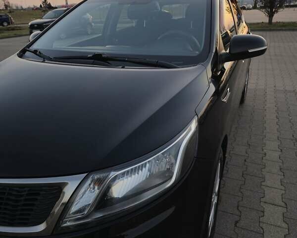 Черный Киа Рио, объемом двигателя 1.59 л и пробегом 137 тыс. км за 7750 $, фото 2 на Automoto.ua