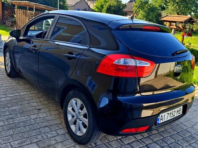 Чорний Кіа Ріо, об'ємом двигуна 1.6 л та пробігом 144 тис. км за 7300 $, фото 5 на Automoto.ua