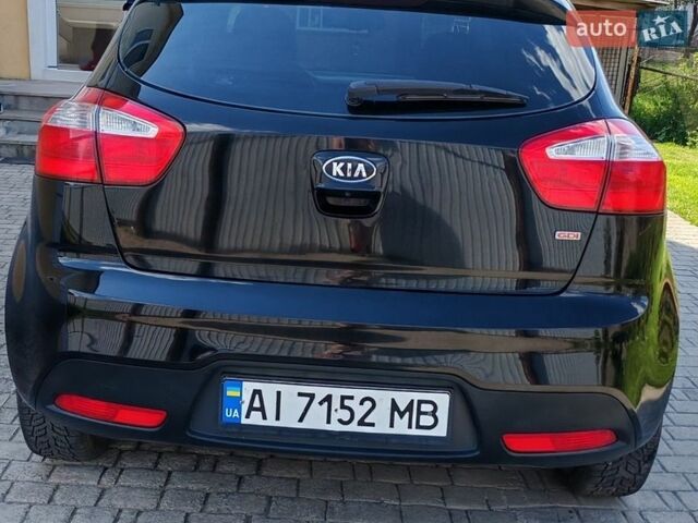 Черный Киа Рио, объемом двигателя 1.6 л и пробегом 149 тыс. км за 7000 $, фото 3 на Automoto.ua